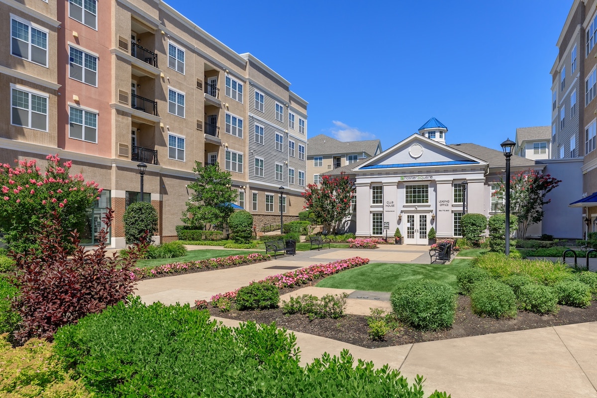 leasing office and apartments with landscaping